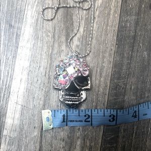 Skull pendant necklace by Betsey Johnson